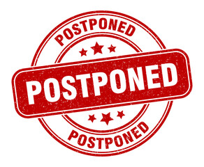 postponed stamp. postponed label. round grunge sign