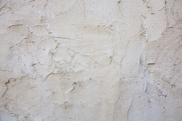 Old grungy cracked wall texture, brick plaster for background use.
