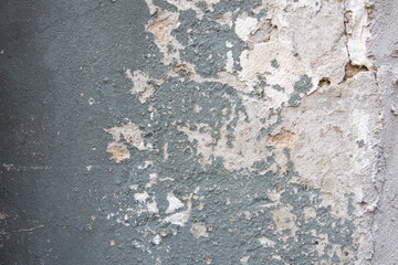 Old grungy cracked wall texture, brick plaster for background use.
