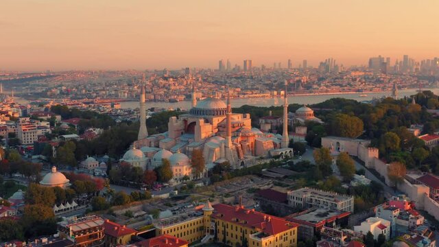 Istanbul, Hagia Sophia (Ayasofya) with a Golden Horn on the background at sunset. Aerial view