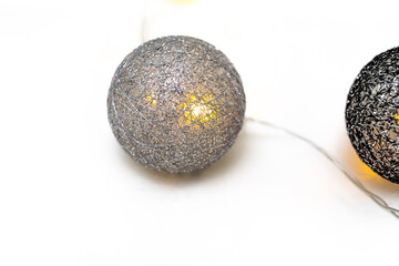 glowing christmas garland. Balls of threads.