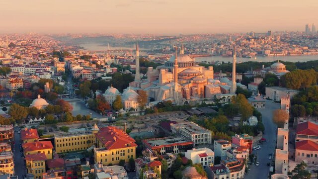 Istanbul, Hagia Sophia (Ayasofya) with a Golden Horn on the background at sunset. Aerial view