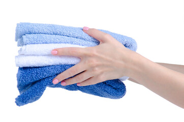 Stack folded towels in hand on white background isolation