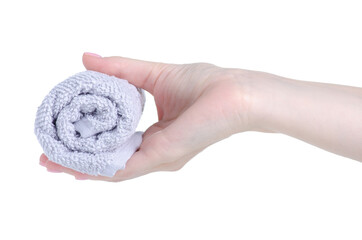 rolled gray hand towel in hand on white background isolation