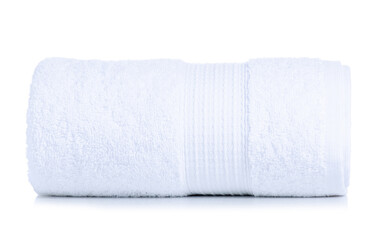 Rolled white towel on white background isolation
