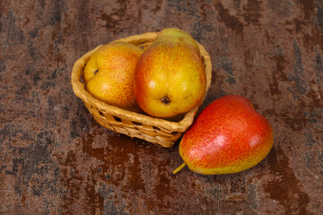 Pear heap in the wooden basket