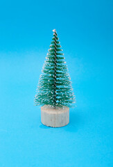 Christmas tree on blue background 