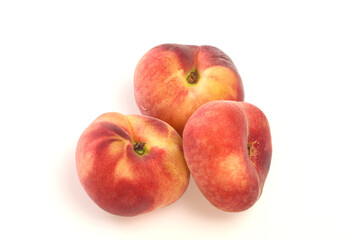 Fototapeta na wymiar Sweet ripe tasty flat peach