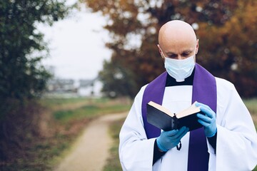 Prayer of a priest in a small village during a pandemic.