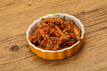 Canned anchovy in tomato sauce