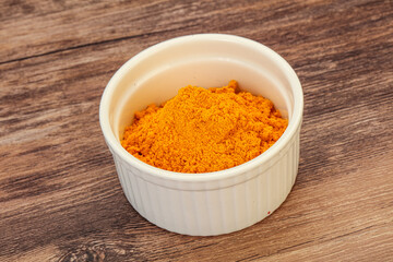 Tumeric powder in the bowl