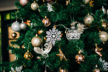 Christmas tree with Christmas toys, lights and garlands