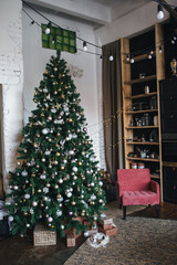 Christmas tree with Christmas toys, lights and garlands