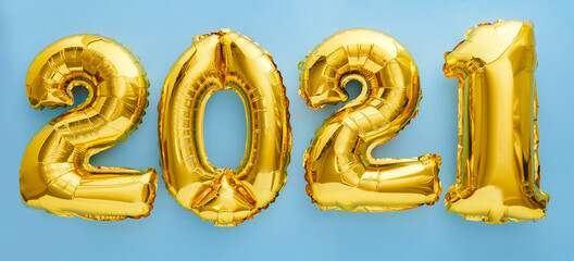 2021 golden balloon text on blue background. Happy New year eve invitation with Christmas gold foil balloons 2021. Flat lay long web banner