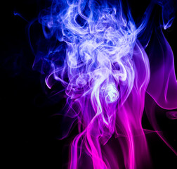 Colored smoke on black background