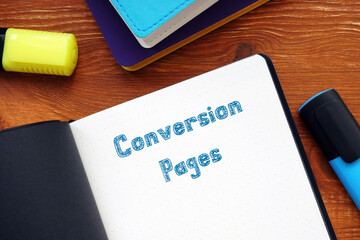 Business concept about Conversion Pages with inscription on the piece of paper.