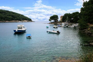 Fototapeta na wymiar boats in a lovely bay, Valdarke, island Losinj, Croatia