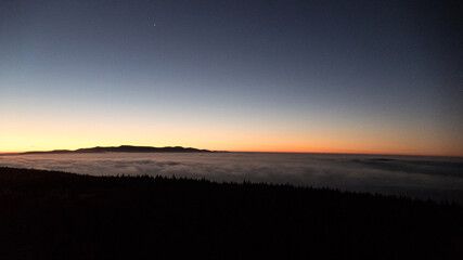 sunrise above the clouds of inversion i the valley