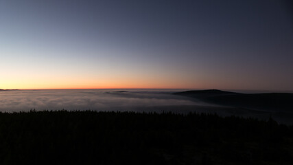 sunrise above the clouds of inversion i the valley