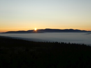 sunrise above the clouds of inversion i the valley