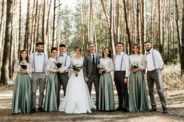 newlyweds with friends and friendships,witnesses at the wedding,wedding day of the bride and...