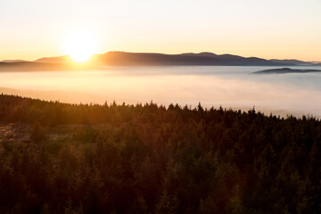 sunrise above the clouds of inversion i the valley