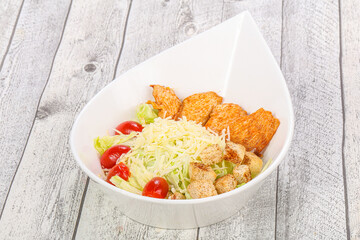 Caesar salad with chicken and parmesan