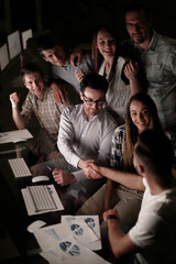 business people shaking hands over the Desk
