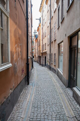 Fototapeta na wymiar Old narrow street in Gamla Stan, Stockholm, Sweden.