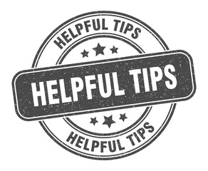 helpful tips stamp. helpful tips label. round grunge sign