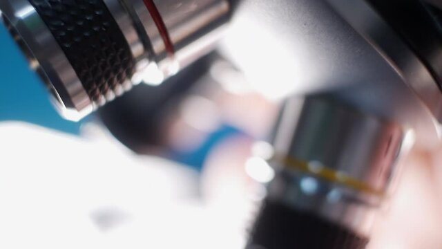Close-up microscope in a biological laboratory, a modern research center. Vaccine production and experimentation.