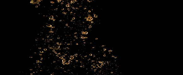 Close up images of oil bubbles from diesel gasoline splashing and floating up to the air on black background for represent power of fuel liquid that active and powerful.