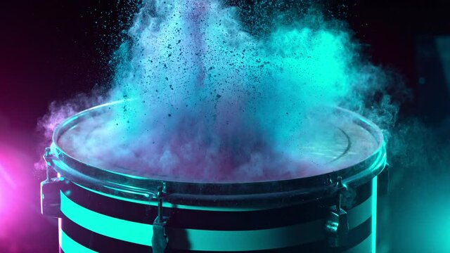 Super Slow Motion Shot of Drum Hit with Color Powder Explosion at 1000 fps.