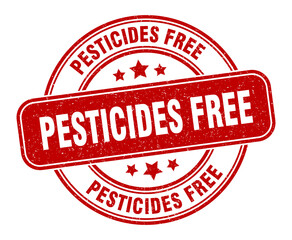 pesticides free stamp. pesticides free label. round grunge sign