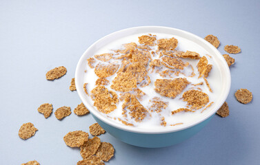 Bran flakes with milk, healthy breakfast, top view