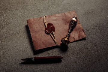 Notary seal, pen, notarized document on a table. Legality concept.