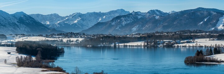 panoramic landscape at winter with alps mountains in Bavaria