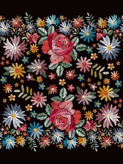 Fototapeta na wymiar Embroidery seamless border with beautiful colorful flowers on black background.