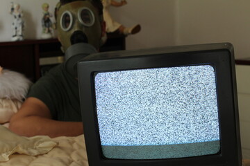 Anxious man watching tv static 