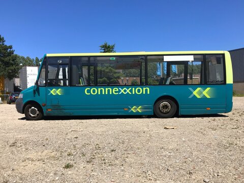 Baarn, the Netherlands - July 1, 2018: Connexxion VDL ProCity mini bus standing at rest. Connexxion is a large public transport bus company in the Netherlands. 