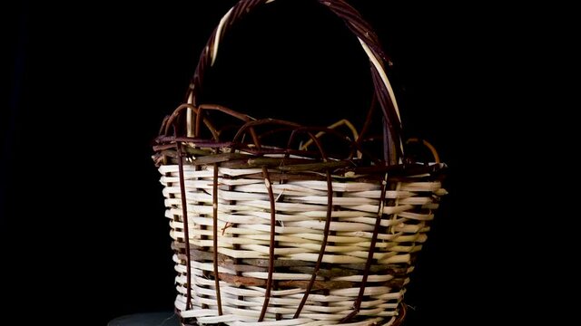 Handmade basket made from fresh branches of natural willow wood