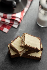 Crispy wafer biscuits filled with chocolate cream.