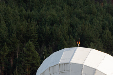 Solar radio telescope hidden in forest nature surveillance spy technology mobile antenna beautiful...
