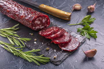 Dry-cured sausage with spices, garlic and herbs  .