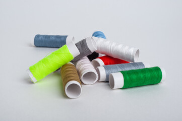 Colourful thread spools isolated on a white