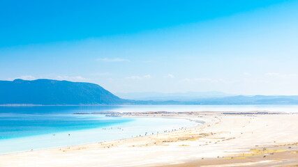 Aerial view over the clear beach and turquoise water of Salda lake. Burdur Province, Turkey