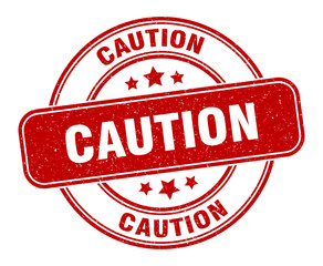 caution stamp. caution label. round grunge sign