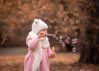  Girl, garden, pink coat, soap bubble blower