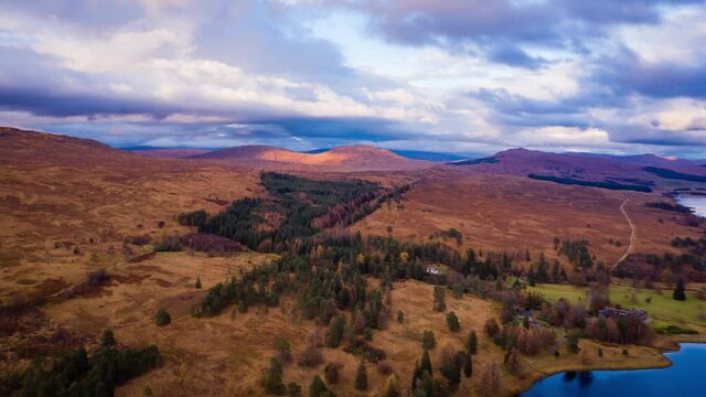 aerial drone shot over Loch Tulla in glen orchy near bridge of orchy in the argyll region of the highlands of scotland during autumn