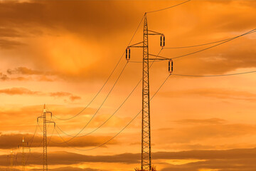 Power line at sunset sky. 